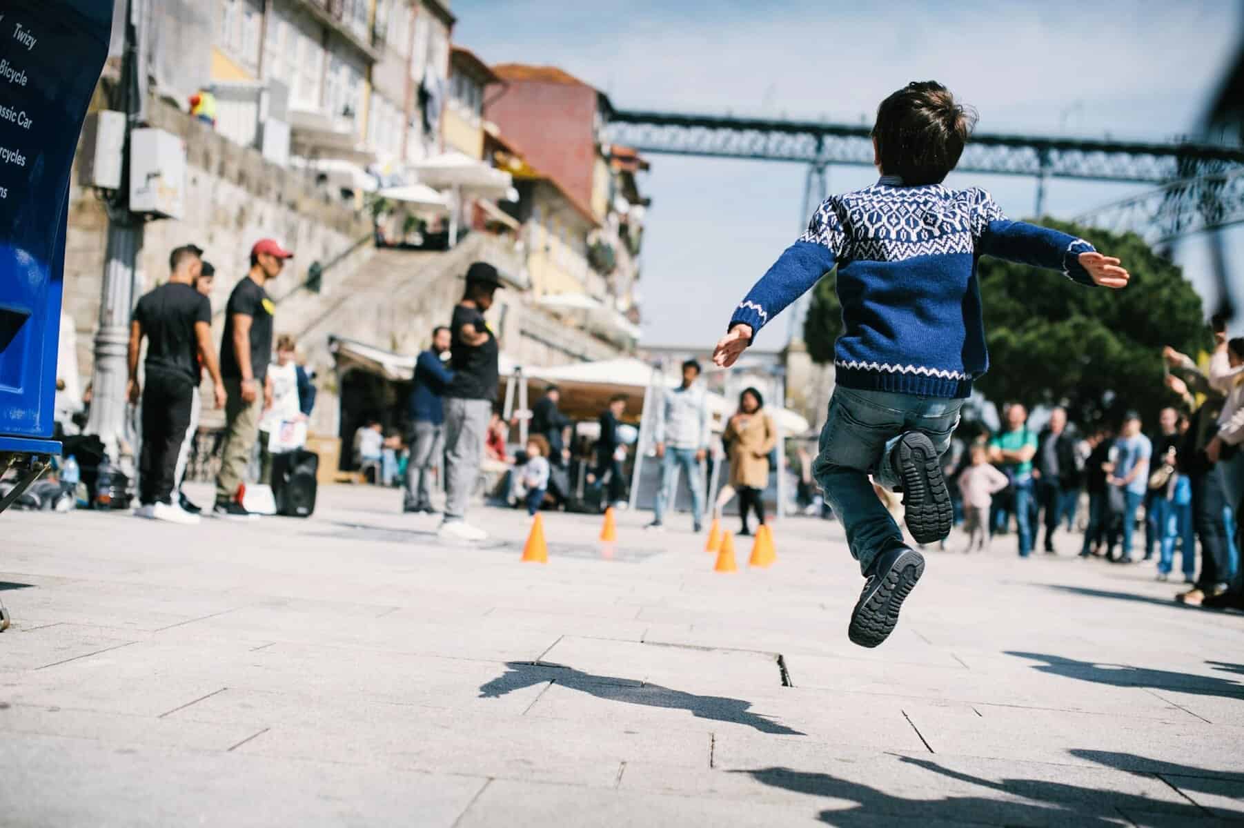 Porto-Portugal-ribeira-kid-running
